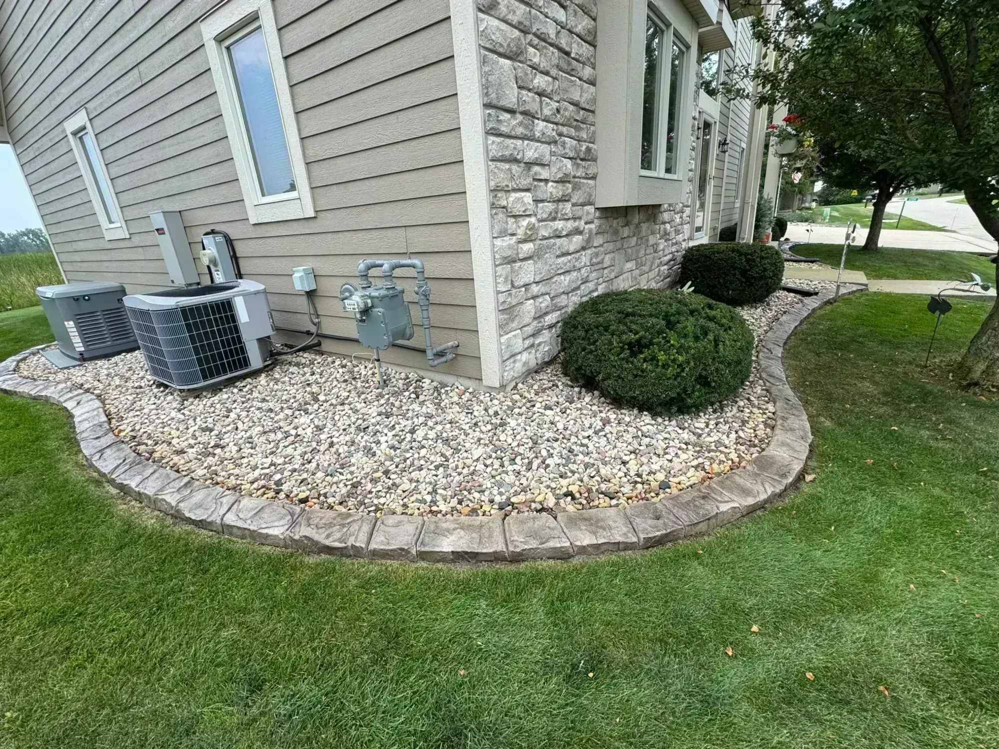 Votis Enterprises Curved Landscape Edging in Eagle River