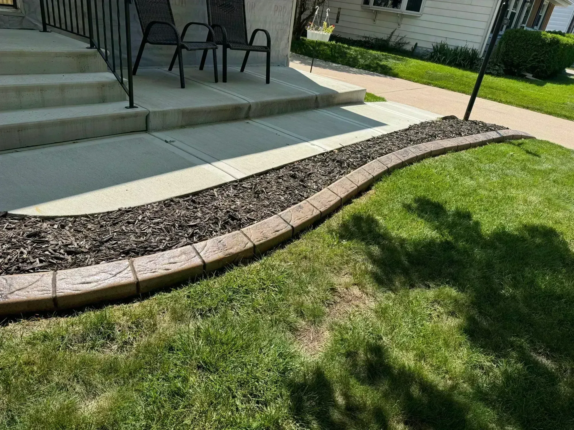Concrete curbing installation in progress