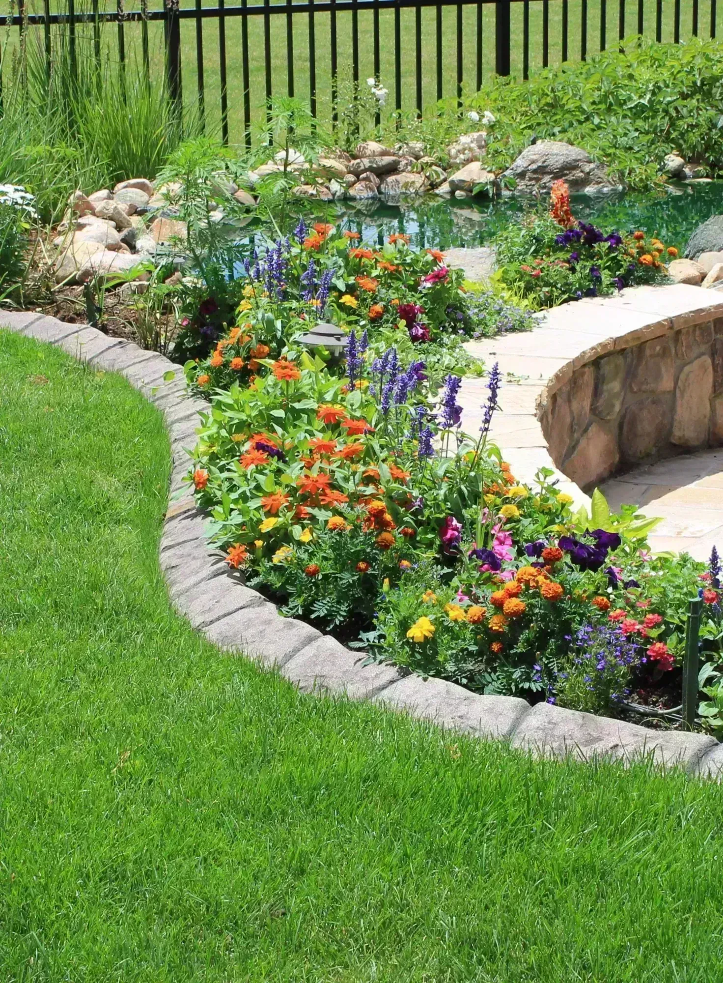 Votis Enterprises Mower Curbing in Three Lakes